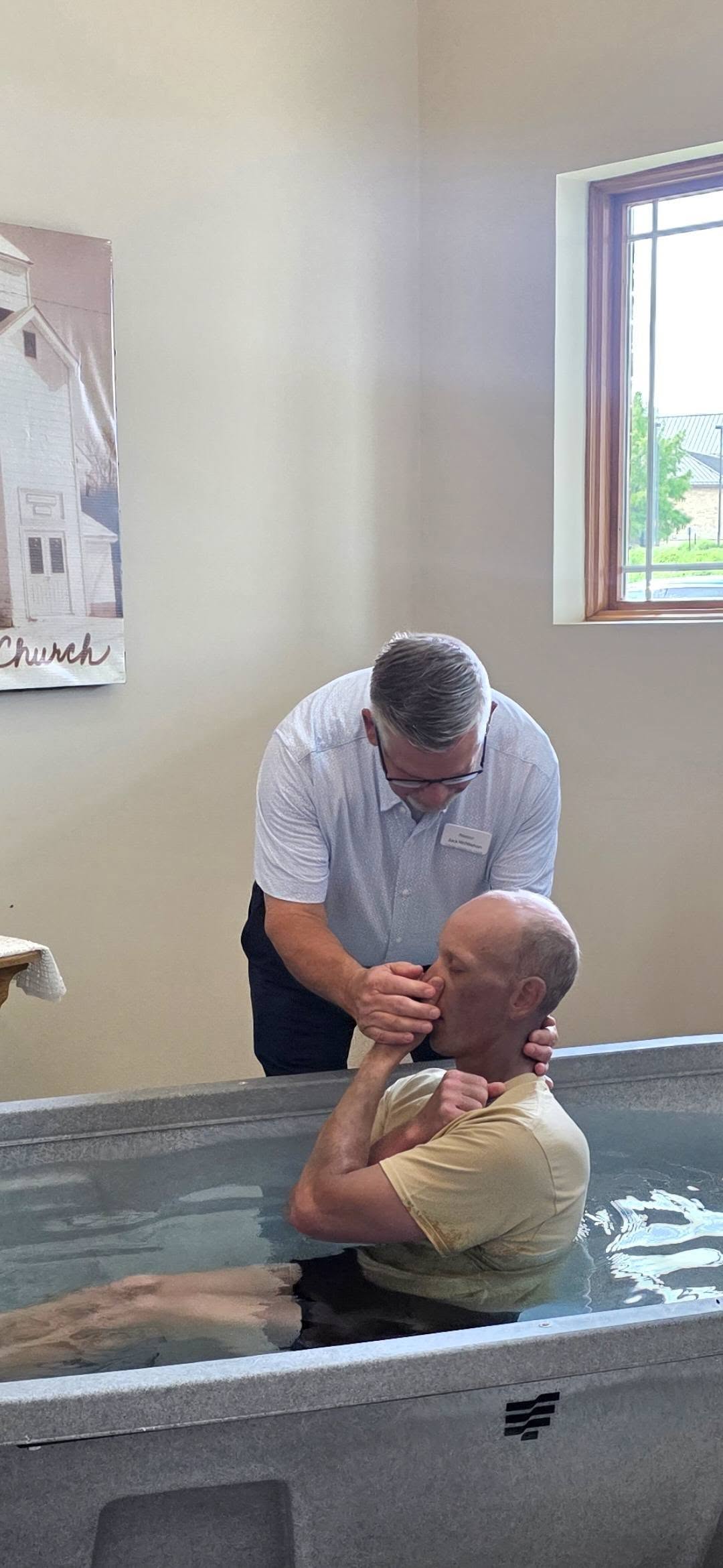 A baptism at Trafalgar Community Church